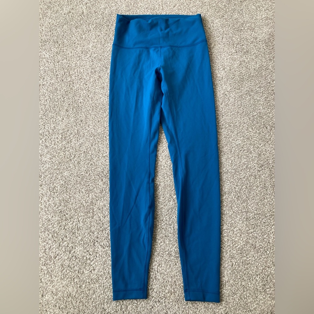 Size 8 teal women’s Lululemon yoga pants/athletic leggings